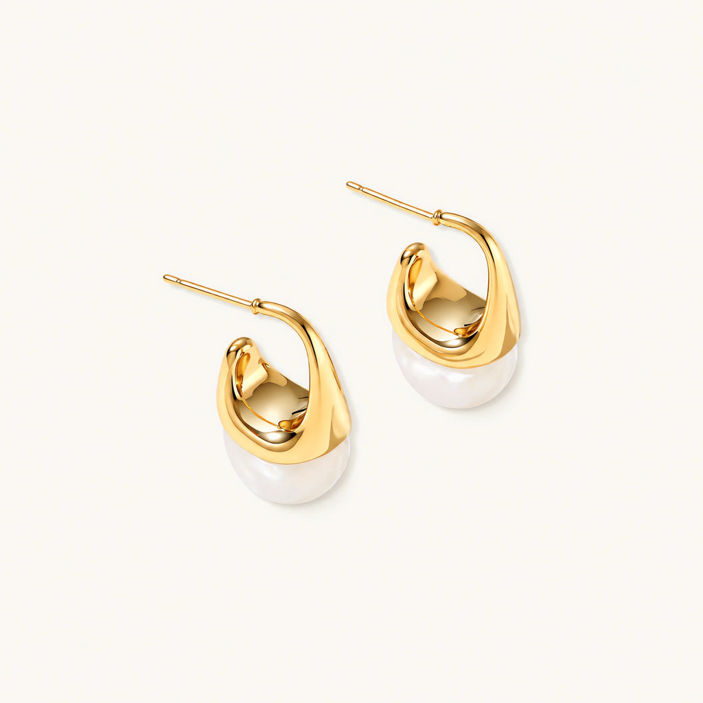 Pair of small gold-plated hoop earrings with triangular cone fronts and curved backs on white background.