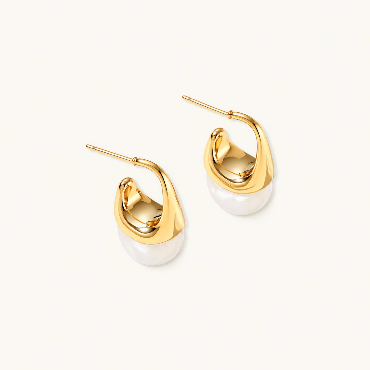 Pair of small gold-plated hoop earrings with triangular cone fronts and curved backs on white background.