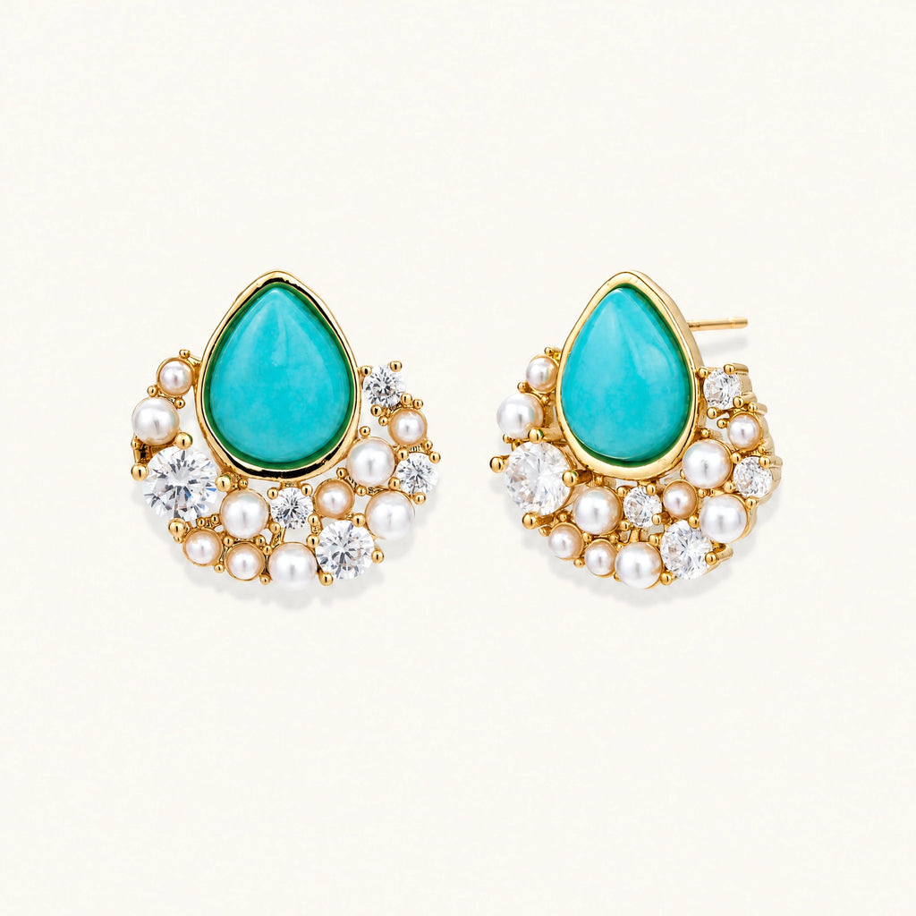Gold-plated cluster earrings with teardrop turquoise stones surrounded by white pearls and clear crystals