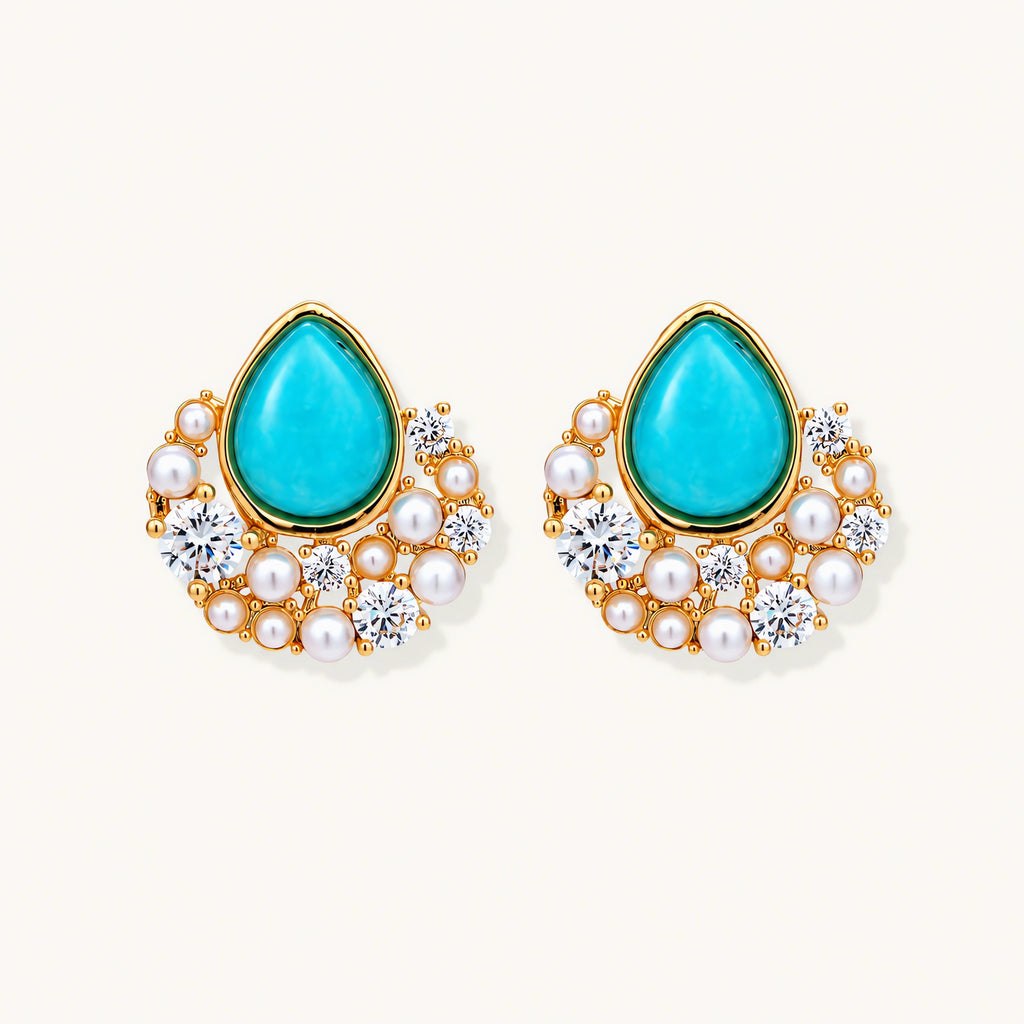 Gold-plated cluster earrings with teardrop turquoise stones surrounded by white pearls and clear crystals