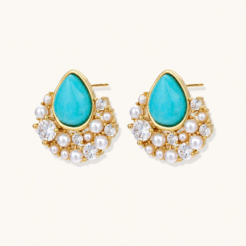Gold-plated cluster earrings with teardrop turquoise stones surrounded by white pearls and clear crystals